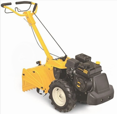 Yellow garden tiller rental equipment